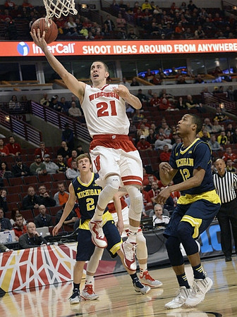 Spike Albrecht (2) and Muhammad-Ali Abdur-Rahkman (12)