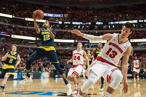 Spike Albrecht (2), Muhammad-Ali Abdur-Rahkman (12), and Zak Irvin (21)