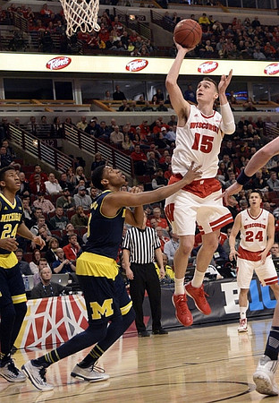 Aubrey Dawkins (24) and Kameron Chatman (3)