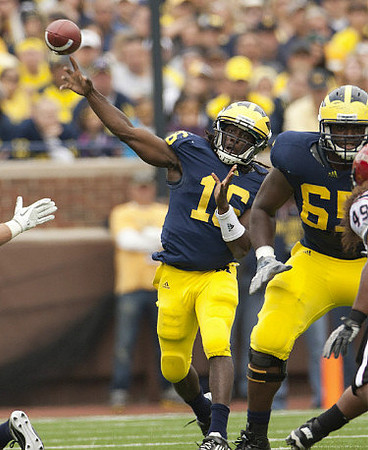Denard Robinson (16) and Patrick Omameh (65)