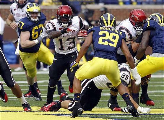 Nathan Brink (67), Troy Woolfolk (29), and Brandin Hawthorne (7)