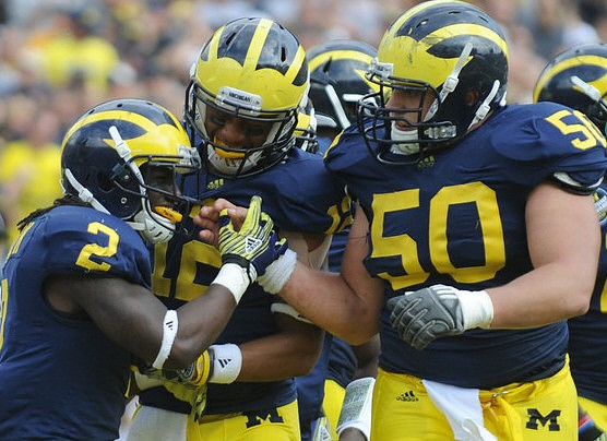 Vincent Smith (2), Roy Roundtree (12), and David Molk (50)