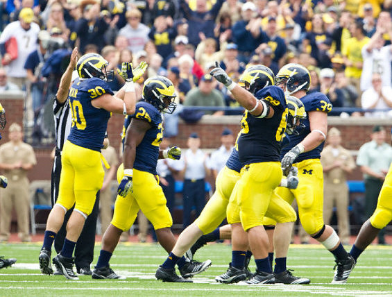 Jake Ryan (90), Kenny Demens (25), Mike Martin (68), and Will Heininger (39)