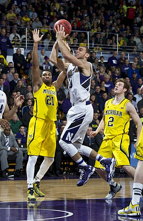 Zak Irvin (21) and Spike Albrecht (2)