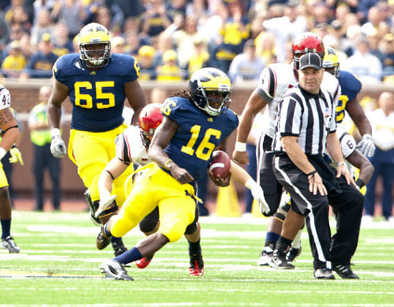 Denard Robinson (16) and Patrick Omameh (65)