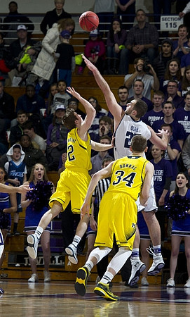 Spike Albrecht (2) and Mark Donnal (34)