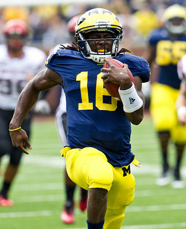 Denard Robinson (16) and Patrick Omameh (65)