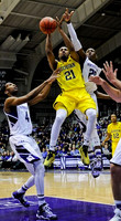 Zak Irvin (21) and Muhammad-Ali Abdur-Rahkman (12)