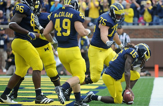 Kevin Koger (86), John McColgan (49), Michael Schofield (75), and Denard Robinson (16)