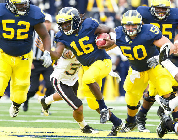 Ricky Barnum (52), Denard Robinson (16), David Molk (50), and Patrick Omameh (65)