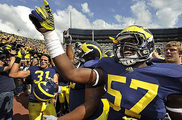 Jared Van Slyke (31) and Frank Clark (57)