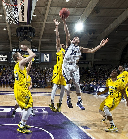 Mark Donnal (34), Spike Albrecht (2), Zak Irvin (21), Muhammad-Ali Abdur-Rahkman (12), and Aubrey Dawkins (24)