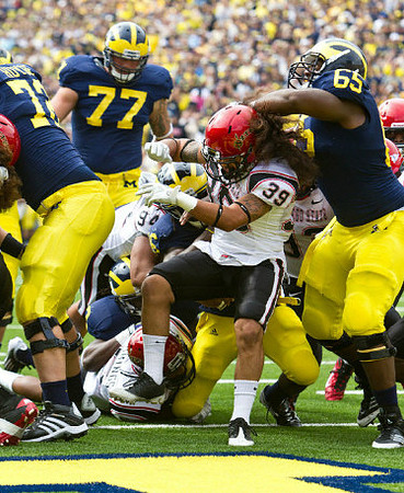 Mark Huyge (72), Taylor Lewan (77), and Patrick Omameh (65)