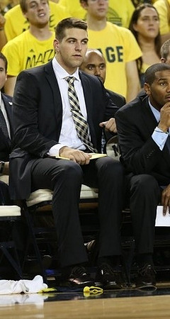 Mitch McGary (4), C.J. Lee, and LaVall Jordan
