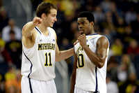 Nik Stauskas (11) and Derrick Walton Jr. (10)