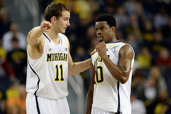 Nik Stauskas (11) and Derrick Walton Jr. (10)