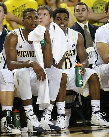 Glenn Robinson III (1) and Derrick Walton Jr. (10)