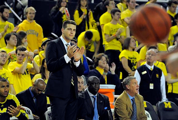 Jon Horford (15), C.J. Lee, Mitch McGary (4), Bacari Alexander, and Jeff Meyer