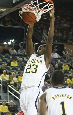 Caris LeVert (23) and Glenn Robinson III (1)