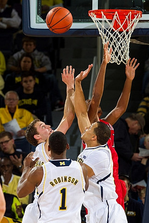 Glenn Robinson III (1), Jordan Morgan (52), and Nik Stauskas (11)
