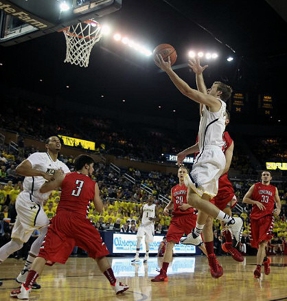 Jordan Morgan (52), Glenn Robinson III (1), and Nik Stauskas (11)