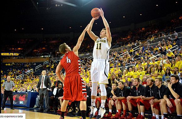 Nik Stauskas (11) and Concordia Head Coach Ricky Yahn