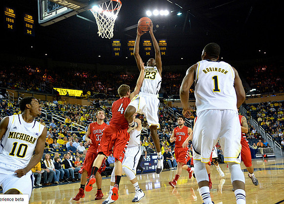 Derrick Walton Jr. (10), Caris LeVert (23), Nik Stauskas (11), and Glenn Robinson III (1)