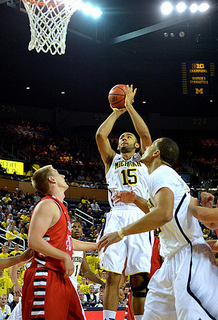 Jon Horford (15) and Jordan Morgan (52)