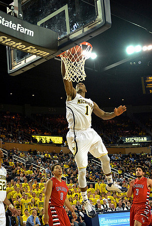 Glenn Robinson III (1) and Jordan Morgan (52)