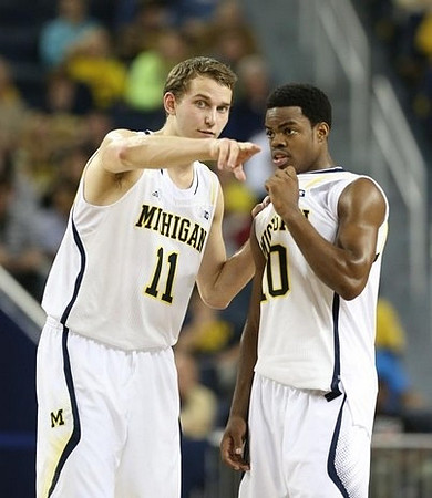 Nik Stauskas (11) and Derrick Walton Jr. (10)