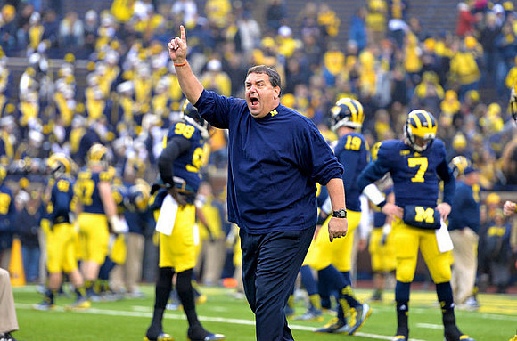 Brady Hoke, Devin Gardner (98), Wilton Speight (19), and Shane Morris (7)
