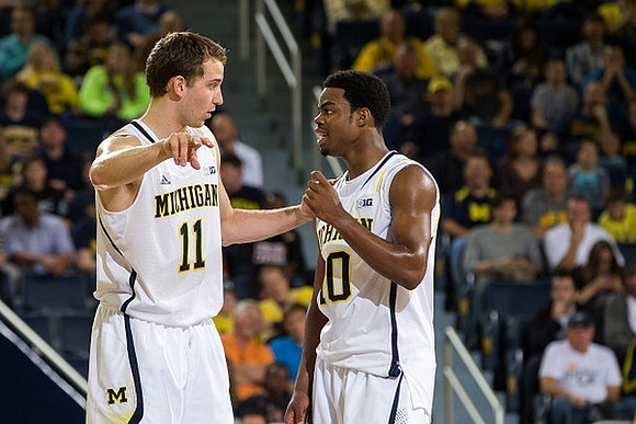 Nik Stauskas (11) and Derrick Walton Jr. (10)