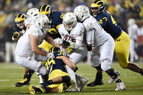 Joe Bolden (35), Bryan Mone (90), and Chris Wormley (43)