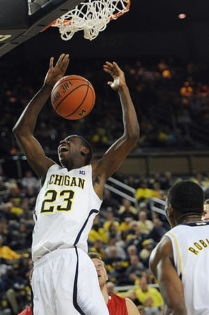 Caris LeVert (23) and Glenn Robinson III (1)