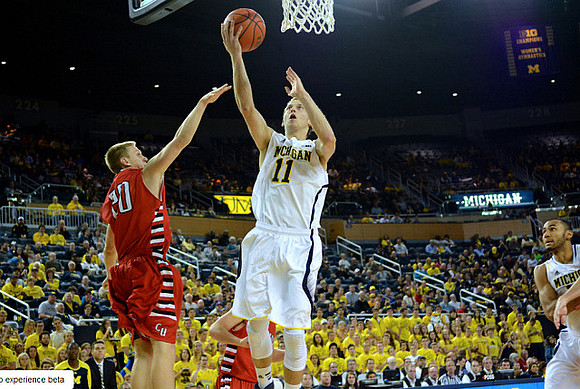 Nik Stauskas (11) and Jon Horford (15)