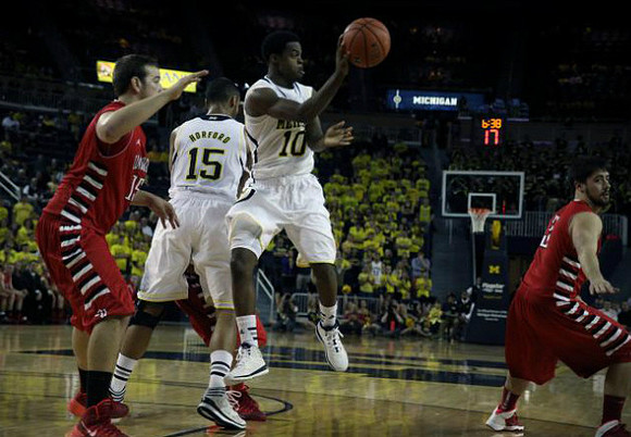 Jon Horford (15) and Derrick Walton Jr. (10)