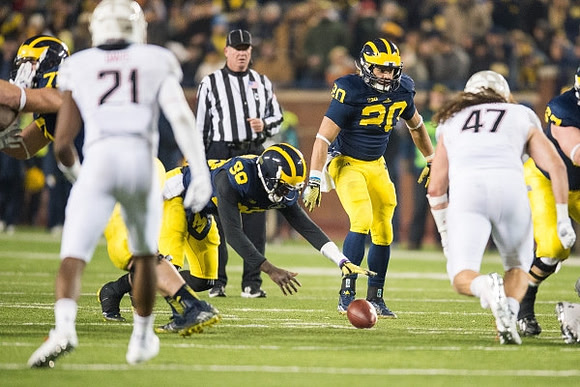 Ben Braden (71), Devin Gardner (98), and Drake Johnson (20)