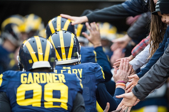 Devin Gardner (98) and Brian Cleary (6)