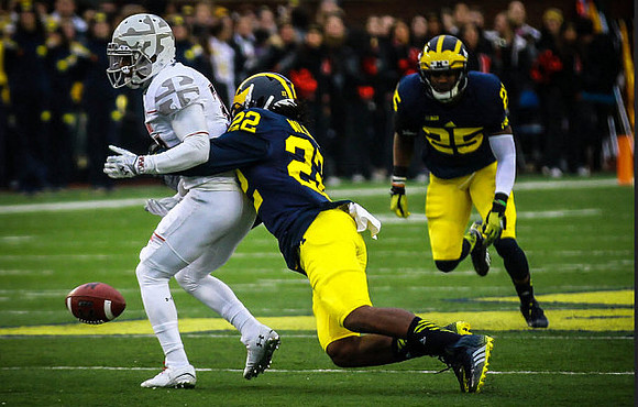 Jarrod Wilson (22) and Dymonte Thomas (25)