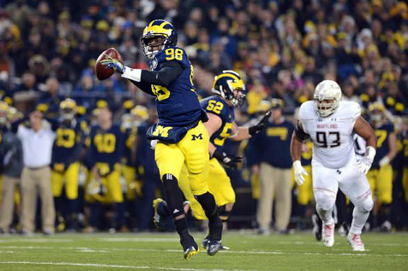 Devin Gardner (98) and Mason Cole (52)