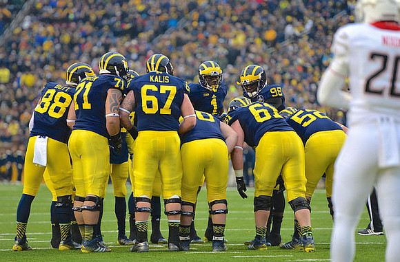 Jake Butt (88), Ben Braden (71), Kyle Kalis (67), Jack Miller (60), Graham Glasgow (61), Mason Cole (52), Devin Gardner (98), and Devin Funchess (1)