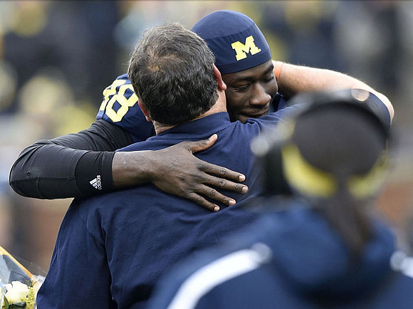 Devin Gardner (98) and Brady Hoke