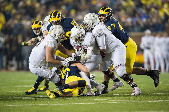 Joe Bolden (35), Ryan Glasgow (96), and Chris Wormley (43)