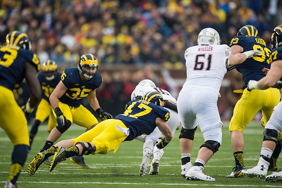Mario Ojemudia (53), Joe Bolden (35), Jake Ryan (47), and Matthew Godin (99)