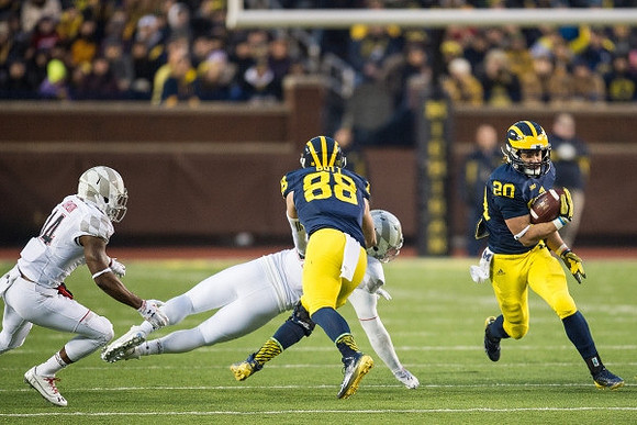 Jake Butt (88) and Drake Johnson (20)