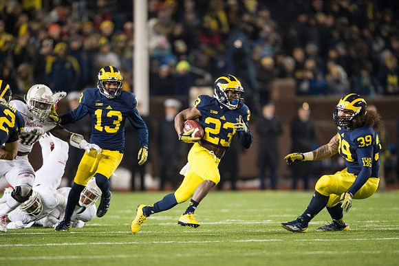 Terry Richardson (13), Dennis Norfleet (23), and Sione Houma (39)