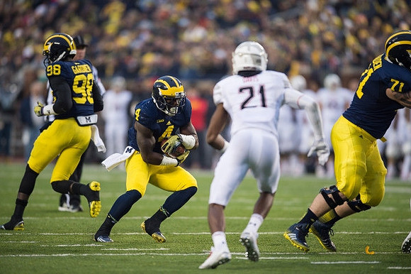 Devin Gardner (98), De'Veon Smith (4), and Ben Braden (71)