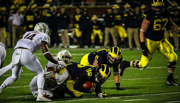 Devin Gardner (98), Mason Cole (52), and Kyle Kalis (67)