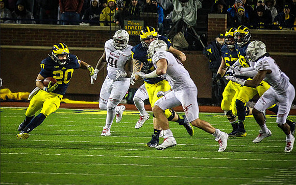 Drake Johnson (20), Ben Braden (71), and Kyle Kalis (67)
