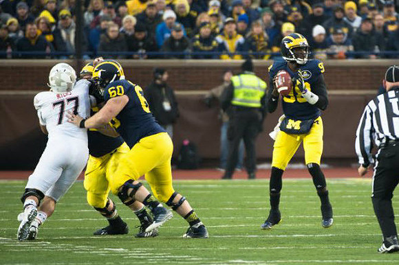 Jack Miller (60) and Devin Gardner (98)
